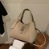Bolso Cubo de Platino de Venta Caliente de Verano Transfronterizo de Nicho para Mujer 2026 Nuevo Bolso Cubo de Hombro Cruzado de Tendencia de Nicho