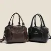 Bolso de mano para mujer transfronterizo, bolso de hombro de nicho para mujer, diseño elegante y versátil, bolso tipo almohada moderno al por mayor