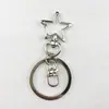 Fabricantes directos en stock suministro hebilla de estrella llavero de corazón juego de tres piezas gota de pegamento accesorios de yak forma especial