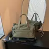 Nueva colección de principios de otoño: Bolso versátil para mujer que se puede llevar en la mano o usar como bolso cruzado, con múltiples compartimentos, un diseño ligero y un estilo simple y casual adecuado para el uso diario y para ir al trabajo.
