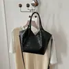 Bolso de textura tejida de nicho para mujer 2026 nuevo estilo moda para ir al trabajo bandolera bolso de mano bolso cubo