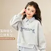 Nueva Sudadera de Estilo Coreano a Rayas con Cuello Polo Falso Dos Piezas para Niños Mayores, Top Versátil Casual de Manga Larga para Primavera y Otoño