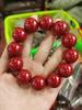 Venta al por mayor de fábrica pulsera de un solo círculo imitación cinabrio étnico hebilla de paz valiente colgante de múltiples estilos pulsera de cinabrio exquisita