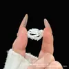 Nuevo anillo de moda de alta gama versátil estilo vintage con forma de estrella y diamantes, lujo ligero, anillo personalizado único y lujoso