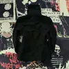 Camiseta de manga corta para mujer estilo americano, con corona de calavera con diamantes de imitación, picante, corte ajustado, corta, que deja ver el ombligo, subcultura niche, hombro derecho
