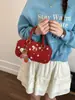 Bolso tipo baguette simple de mano estilo coreano para mujer 2026 Primavera Nuevo Versátil Casual Textura de Alta Calidad Bolso de Hombro Cruzado
