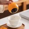 Creativo pequeño recipiente de té naranja, tarro de cerámica sellado a prueba de humedad para almacenamiento de té, recipiente de té portátil con impresión de logotipo