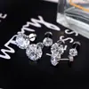 Brincos de Aço Inoxidável Redondos para Bolo com Zircônia Stud Quatro Garras Zircônia 3A Brincos Planos Integrados Joias para Piercing de Osso