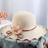 Venta al por mayor verano nuevo tejido transpirable sombrero de pescador niños protección solar protector solar sombrero de cuenca de flor escénica de resort de playa