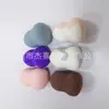 Huevos de espuma para maquillaje de belleza Jie Xi al exponerse al agua se vuelven más grandes herramientas de maquillaje para base no se caen residuos no consumen polvo suaves