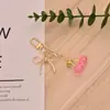 Llavero Colgante Ins Dulce y Fresco Coreano Lazo Corazón de Melocotón Estrella de Cinco Puntas Llavero Chica Rosa Colgante para Bolso de Teléfono Móvil