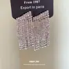 Nuevos aretes de plata con pasador y borlas de diamante, aretes simples y elegantes para el día a día, lujo ligero con un toque de alta gama, aretes versátiles para mujer