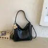 Bolsa de dumplings de gran capacidad para mujer, nuevo diseño de nicho vintage 2026, bolso de hombro cruzado, mochila multifuncional