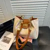 Bolsas de Palha Tecidas para Primavera e Verão Femininas 2026 Novo Estilo Bolsa de Ombro Bolsa Tote de Grande Capacidade Bolsa de Palha para Férias na Praia Casual