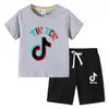2026 Verão Nova Camiseta Infantil Comércio Exterior Roupas Infantis Ins Estilo Coreano Algodão Infantil Manga Curta e Shorts Conjunto de Duas Peças