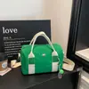 2026 Nueva Moda Bolso de Hombro Único Estilo Coreano para Mujer Alta Apariencia Bolso de Mano Tipo Almohada Casual Ligero para Viaje Bolso Cruzado