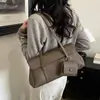 Bolsa tote de alta qualidade, estilosa e minimalista para o dia a dia em 2026; nova bolsa de ombro feminina, versátil e fácil de combinar com qualquer look; bolsa de axila feminina