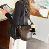 Bolso de cubo nuevo y moderno para mujer 2026, diseño de nicho con estética retro y minimalista, bolso de hombro versátil para mujer