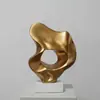 Adornos modernos, minimalistas y lujosos de resina con forma de hoja de ginkgo para gabinetes de TV y entradas, con acabados en color dorado, una estética de alta gama y un diseño único.