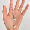 Nuevo Accesorio de Borla Hecho a Mano de Flor de Lirio del Valle Mariposa Plateada Estilo Chino para Cheongsam, Hanfu, Colgante de Coche y Decoración de Solapa