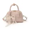 Bolso de Mano Ligero de Lujo Simple y Versátil Estilo Carcasa para Mujer Nuevo de Primavera 2026 Elegante Bolso de Hombro Cruzado con Textura de Alta Calidad