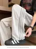 Pantalones deportivos americanos al por mayor transfronterizos para hombre, pantalones de chándal de verano, raya lateral, pantalones casuales para hombre y mujer, marca de moda, pantalones de pierna ancha