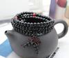 Pulsera de Cuentas de Buda 108 Venta al por Mayor Suministro Puesto Callejero Joyería Imitación Sándalo Rojo Hoja Pequeña Pulsera de Tres Círculos Regalo Transmisión en Vivo E-Commerce
