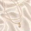 Collar francés explosivo rojo de Internet de moda con perla de mijo y cadena de clavícula doble con pequeño giro, collar de cadena para mujer al por mayor