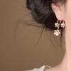 Brincos de borla de flor de fada super estilo francês, design de metal, senso pequeno, alto valor de cor, todos os brincos elegantes da moda feminina