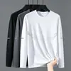 Camiseta elástica de manga larga para hombre, corte holgado, adecuada para primavera y otoño, color liso, versátil, se puede usar como atuendo de pareja, capa interior para hombre