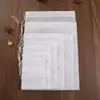 Saco de filtro não tecido saco de chá sachê sachê saco de forro para sachê saco de filtro para ingredientes cozidos à moda saco respirável com cordão para temperos em estoque