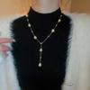 Nuevo collar de perlas artificiales de doble capa apiladas, exquisita cadena de clavícula de moda transfronteriza, elegante cadena de lana ligera de lujo francesa