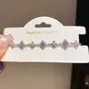 Pulsera de Doble Capa con Flor de Trébol de Cuatro Hojas y Circonita Cúbica Estilo Coreano Pulsera de Temperamento Lujo Ligero Sensación de Alta Gama Moda Versátil Joyería para la Mano del Viaje al Trabajo