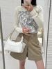 Ropa de Mujer de Alta Gama Estilo Europeo Shenzhen Nanyou Suéter de Cachemir Suave con Bordado Pesado Estilo Chanel en Stock