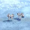 Pendientes de plata de ley S925 con moissanita transfronterizos, pendientes de lazo de lujo ligero, venta al por mayor de fábrica de joyería de plata europea y americana