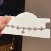 Pulsera de Hierba de la Suerte Flor Estrella Calada de Circonita Lujo Ligero Moda Exquisita Elegante Nicho Joyería de Mano de Gama Alta para Mujeres