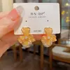 Pendientes Personalizados de Moda Transfronterizos Europeos y Americanos, Exagerados de Metal Hueco con Forma de Pétalo de Flor y Perla, Pendientes Versátiles Elegantes de Lujo Ligero