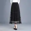 Falda casual de malla de moda acampanada 2026 primavera/otoño nuevo estilo cintura elástica versátil adelgazante longitud media falda moderna