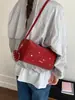 Bolso Pequeño Versátil con Tachuelas para Mujer de Principios de Primavera Transfronterizo 2026 Nueva Moda Bolso Almohada Texturizado Elegante Bolso de Hombro Cruzado