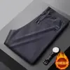 Calça Esportiva Masculina de Veludo Cotelê Grossa Liso Cor Sólida Solta Elástica Forrada com Fleece Outono Inverno Calça Casual Versátil Venda por Atacado Comércio Exterior