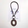 Chaveiro Huayang Nova Couro PU 26 Letras Inglesas Pingente de Cordão de Letra Única com Borla Colorida de Couro