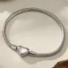 Nuevo Pulsera de Acero de Titanio Redonda Serpiente Corazón Colgante Pulsera para Mujer Nicho Lujo Ligero Gama Alta Transfronterizo Popular Pulsera