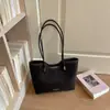 Bolso tote nuevo estilo coreano con estampado de leopardo para principios de otoño de 2026, bolso de hombro de gran capacidad para el trabajo y los desplazamientos, bolso de mano simple y único