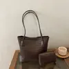 Bolso transfronterizo de nueva textura para mujer, versión coreana, versátil, tejido, PU, para mujer, de un solo hombro, elegante, retro, para ir al trabajo, bolso para madre e hijo