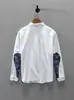 Camisa casual minimalista de manga larga estilo japonés para hombre, nueva colección otoño 2026, moda retro, versátil, corte holgado, diseño de retazos