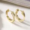 Brincos Geométricos Aogu Transfronteiriços Mais Vendidos de Nicho Exquisitos Banhados a Ouro 18K com Zircônia para Mulheres, Brincos Versáteis Vintage Novos