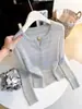 Suéter de punto calado con cuello en V de temperamento estilo pequeño Chanel para mujer, nuevo diseño de principios de otoño, ajuste ceñido, prenda exterior versátil, top rejuvenecedor