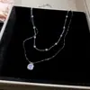 Collar con colgante de calabaza con incrustaciones de circonita y técnica de goteo de aceite para otoño e invierno, sensación de lujo ligero y alta gama, cadena para la clavícula, joyería versátil de nicho para el día a día de las mujeres