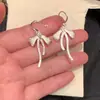Brincos de Laço de Fita Esmaltados Brancos Doces e Elegantes Estilo Francês para Mulheres, Luxo Leve, Alto Padrão, Brincos Versáteis