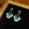 Pendientes Colgantes de Bronce Antiguo Occidental Chapado en Oro Retro de 18 Quilates con Esmalte Azul Diseño Azul Nube